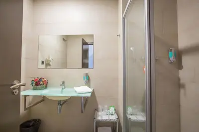 a bathroom with a sink and a shower at Hotel Venture Sant Cugat in Sant Cugat del Vallès