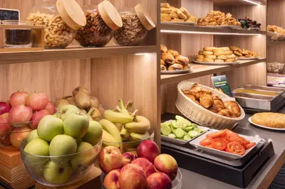 a bunch of different types of fruits and vegetables at B&B HOTEL Barcelona Rubí in Rubí