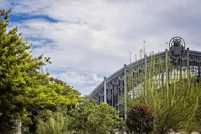 a large building with a clock on top of it at Sweett - Wellington in Barcelona