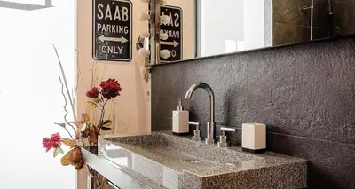 a bathroom with a sink and a mirror at Loft en Gràcia ArchsenseApartments in Barcelona