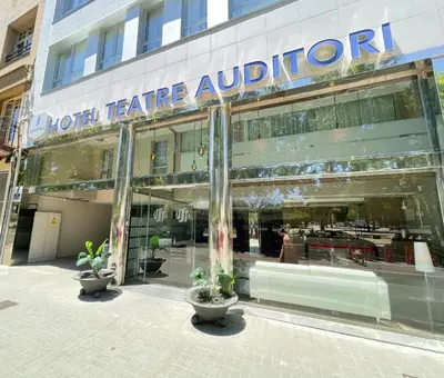 a store front of a building with a sign on it at SM Hotel Teatre Auditori in Barcelona