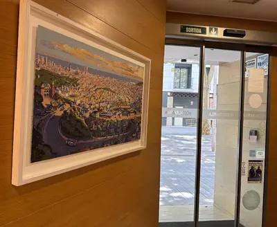 a painting of a city on a wall at Hostal Rambla in Sant Boi del Llobregat