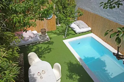 an overhead view of a backyard with a swimming pool at Fridays Flats Villa Alba in Barcelona