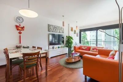 a living room with a couch and a table at Jie Apartment in Sant Adria de Besos