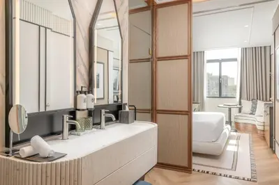 a bathroom with a sink and a mirror at BLESS Hotel Barcelona in Barcelona