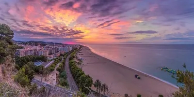 an aerial view of a beach with a sunset at Summer Hotel in Calella