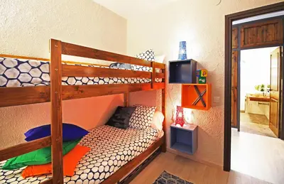 a bedroom with a bunk bed with a bunk bedouble at Casa Rural Els Pins in Sant Marçal