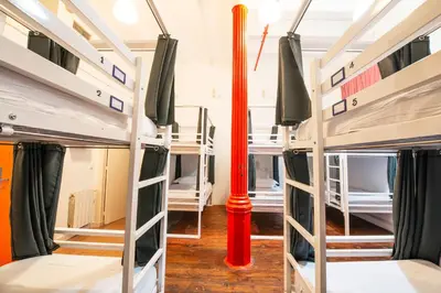 a room with bunk beds in a hostel at Safestay Barcelona Gothic in Barcelona