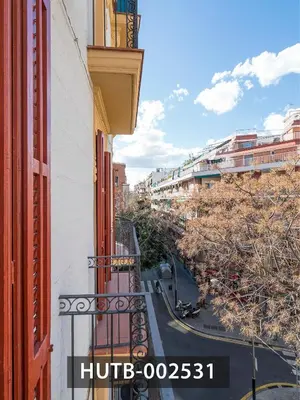 a view of a street from a balcony of a building at Elegantniy Poble Sec in Barcelona