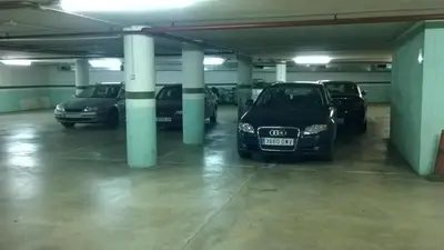 a group of cars parked in a parking garage at Hotel Montmeló in Montmeló