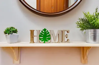 a shelf with a sign that says me at Spacious 4 Bedroom Apartment Fira BCN & Camp Nou in Barcelona