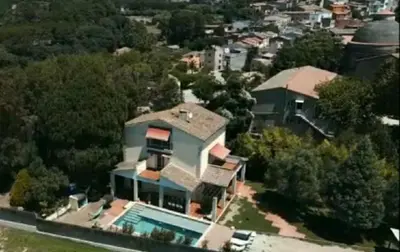 an aerial view of a house with a swimming pool at Les Canyes Cottage, Private Villa Resort in Piera