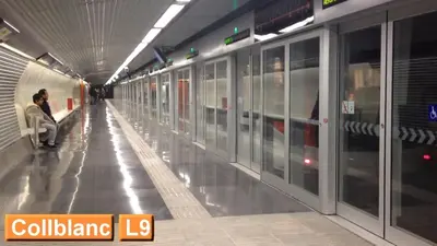 a subway station with people sitting in the aisle at Hawaii Fira Barcelona in Hospitalet de Llobregat