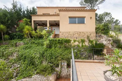 a house on the side of a hill at HHBCN Can Surià in Olivella
