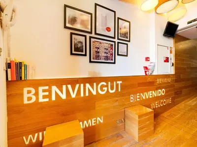 a sign for a bench in a store at Hostal Athenas in Sant Adria de Besos