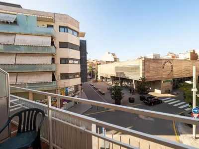 a view of a street from a balcony of a building at Hostal Athenas in Sant Adria de Besos