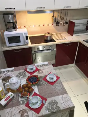 a kitchen with a table with food on it at Apartamento Gran Via de les Corts Catalanes in Barcelona