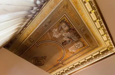an ornate gold ceiling with a painting on it at Storni Barcelona by Forget me not in Barcelona
