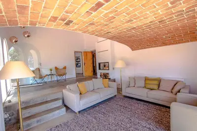 a living room with two couches and a table at Catalunya Casas Majestic Villa and Views , 30km to Barcelona in Corbera de Llobregat