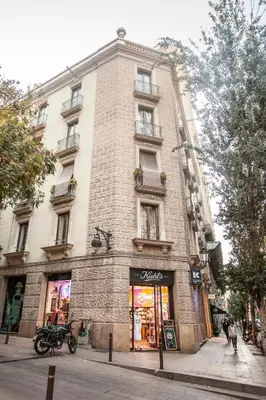 a large brick building on a city street at BCNGOTIC 42 in Barcelona