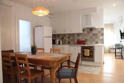 a living room with a couch and a window at Apartaments IXA in Manresa