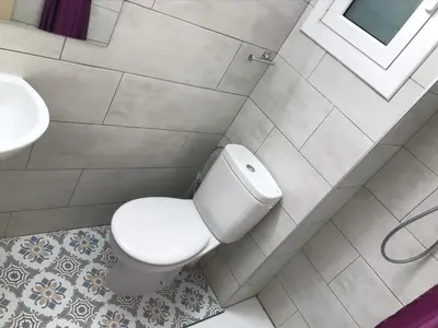 an overhead view of a bathroom with a toilet and sink at Hostal Radio Barcelona in Barcelona