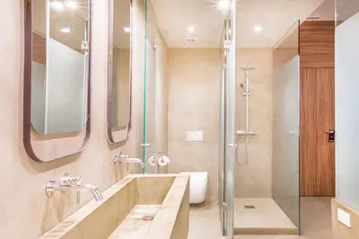 a bathroom with a shower and a tub and a sink at Casa Lirio in Barcelona