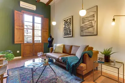 a living room with a couch and a table at Sweett - Ausias Marc in Barcelona