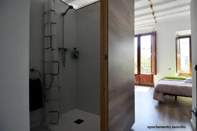 a bathroom with a shower with a glass door at apartamento en el centro in Vilanova i la Geltrú