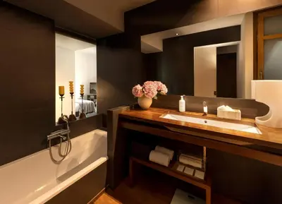a bathroom with a sink and a mirror and a tub at Primero Primera in Barcelona