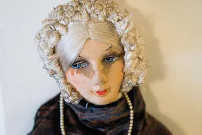 a statue of a woman with blonde hair at Pars Teatro Hostel in Barcelona
