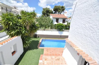 an overhead view of a swimming pool in a backyard at Villa Bianca in Sitges