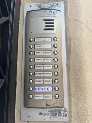 a remote control is attached to a wall at Hostal Madrazo in Barcelona
