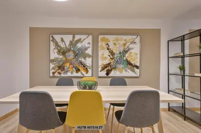a conference room with a table and four chairs at Alcam Office up in Barcelona