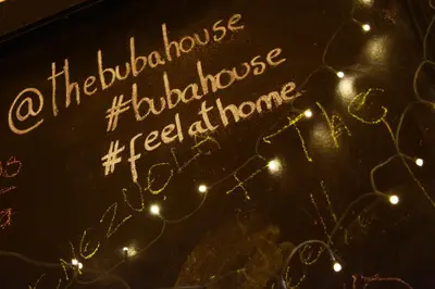 a sign with the wordsaldehyde hiloilo hogoser fireharmharmore at Buba House - Women Only Hostel in Barcelona