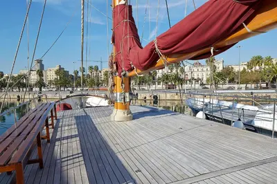 a wooden deck of a sail boat in the water at Southern Cross in Barcelona
