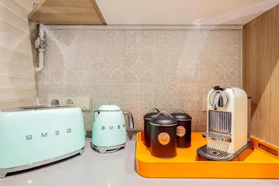a kitchen with two appliances on a counter at The Gaudi Suites in Barcelona