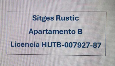 a sign with the names of different languages at Sitges Rustic Apartments in Sitges