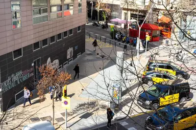 an overhead view of a city street with taxis at Bonavista Apartments - Eixample in Barcelona