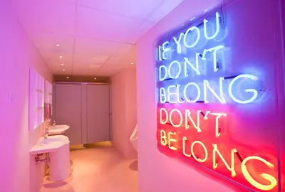 a bathroom with a sign that says if you dont belong dont be wrong at Vincci Bit in Barcelona