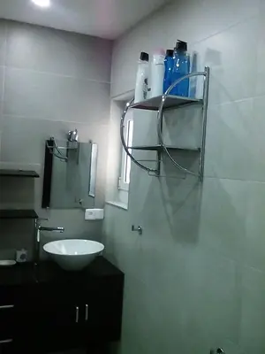 a bathroom with a sink and a mirror at Piso luminoso en Barcelona in Barcelona