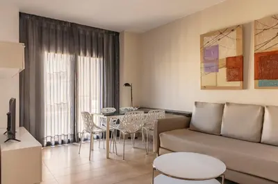 a kitchen with a sink and a washing machine at Barcelona Apartment Gran de Gràcia in Barcelona
