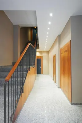 a hallway with a staircase in a building at Barcelona Apartment Gran de Gràcia in Barcelona