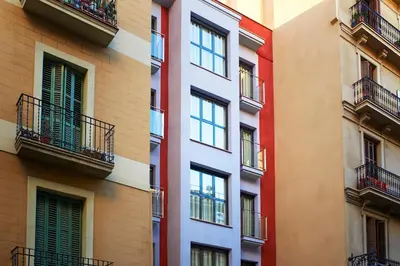 a living room with a couch and a table at Barcelona Apartment Gran de Gràcia in Barcelona
