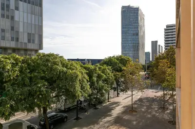 a street in a city with trees and buildings at 4131 - AB Diagonal - Sant Adrià de Besòs in Sant Adria de Besos