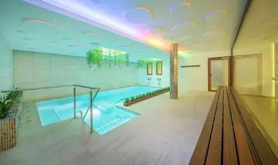 a large bathroom with a large swimming pool at Sono & SPA - Adults Only in La Garriga
