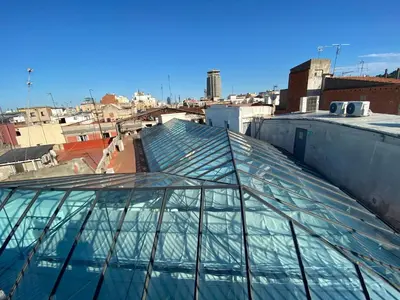 a glass dome on the roof of a building at Hotel Peninsular in Barcelona