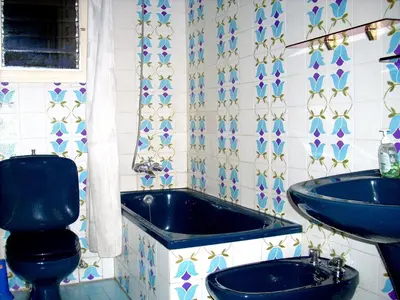 a bathroom with a tub and a toilet and a sink at CALELLA DE LA COSTA ( Maresme - Costa Brava) in Calella