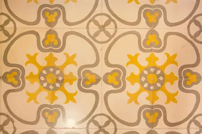 a tile wall with a colorful pattern on it at Novus Homes Barcelona Gracia in Barcelona