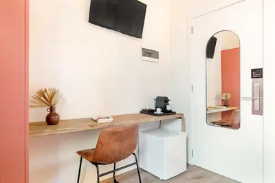 a home office with a desk and a chair at LeMar by Aspasios in Barcelona
